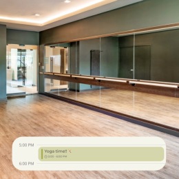 yoga room with wooden flooring