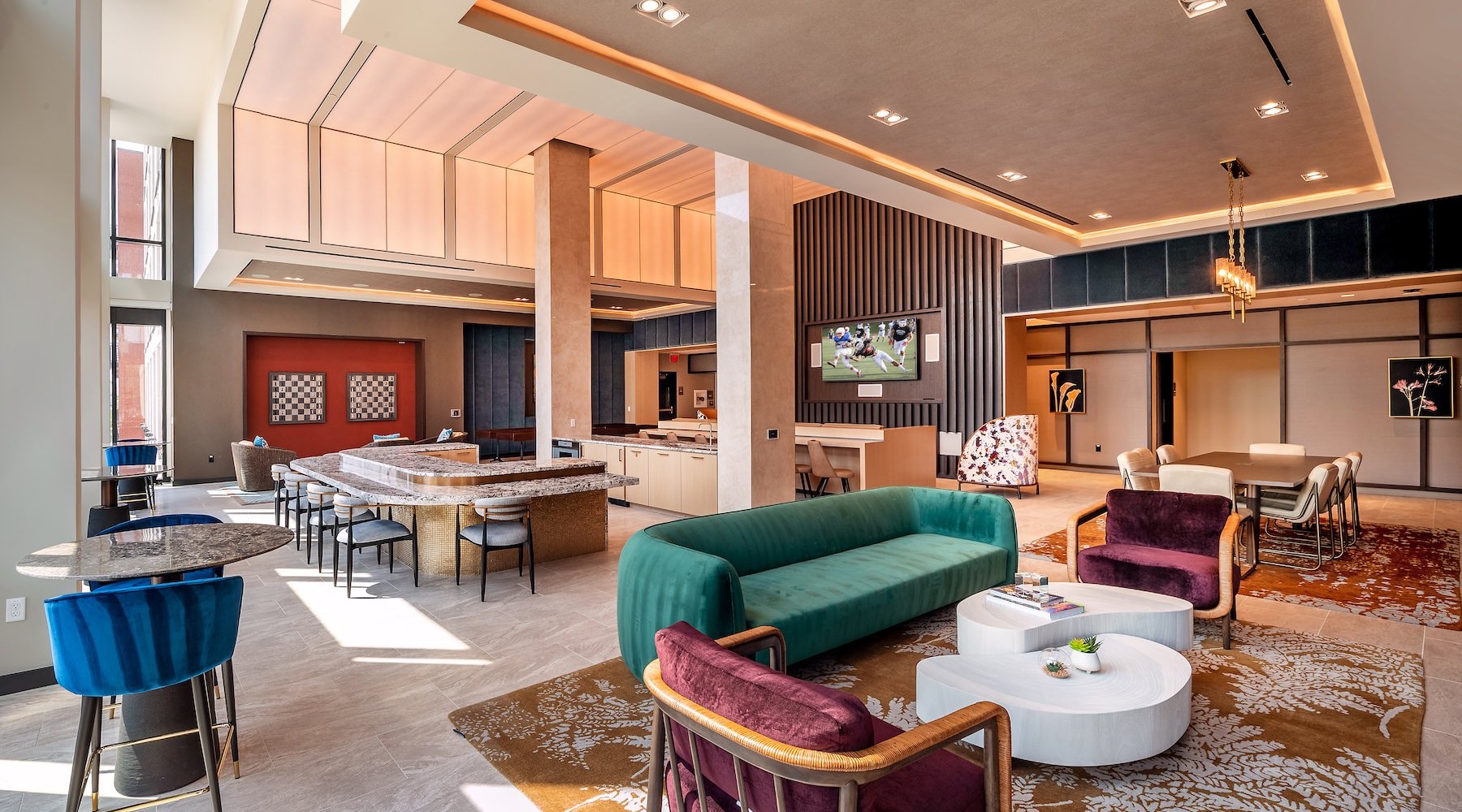 clubhouse with seating tv and tables